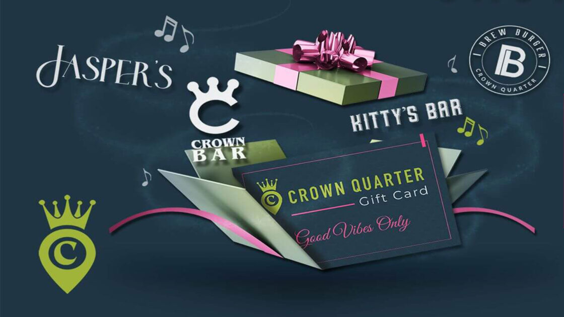 An image of a voucher for Crown Quarter breaking out of a gift box with the hotels' logos for Crown Bar, Jaspers and Kitty's Bar showing. A hotel gift voucher for Crown Quarter is the best gift vouchers for hotels in Ireland as it can be used for a stay in the Wexford Hotel or in the bars or restaurant.